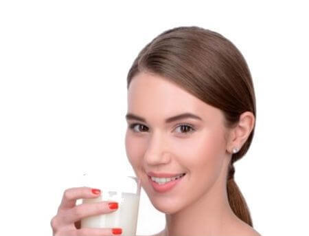 la mesa dental model with glass of milk